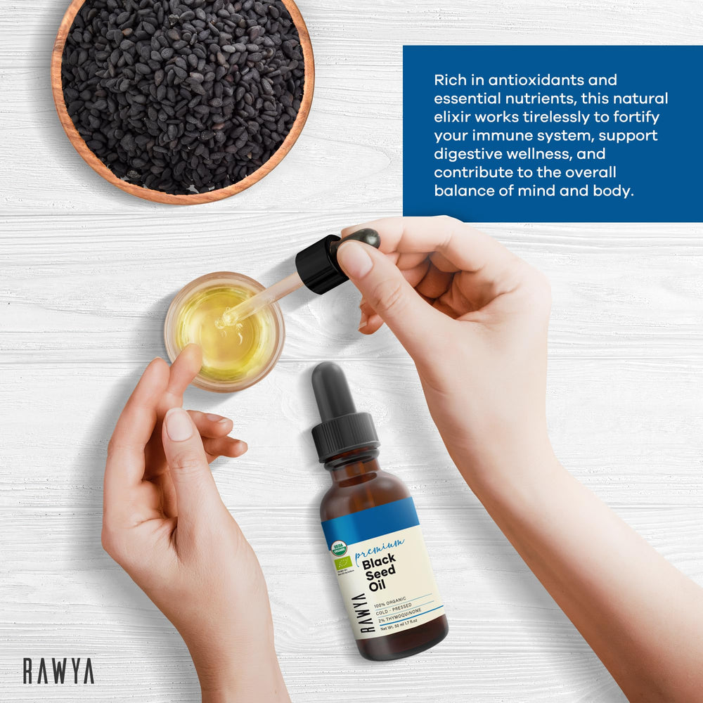RAWYA Black Seed Oil amber glass bottle displays premium cold-pressed quality.