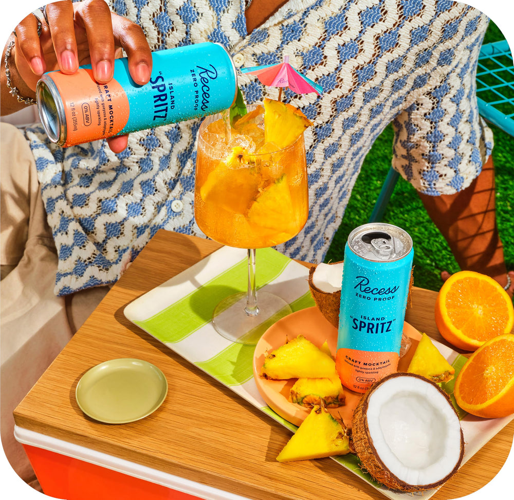 Recess Island Spritz pour showing refreshing tropical aroma for gatherings.