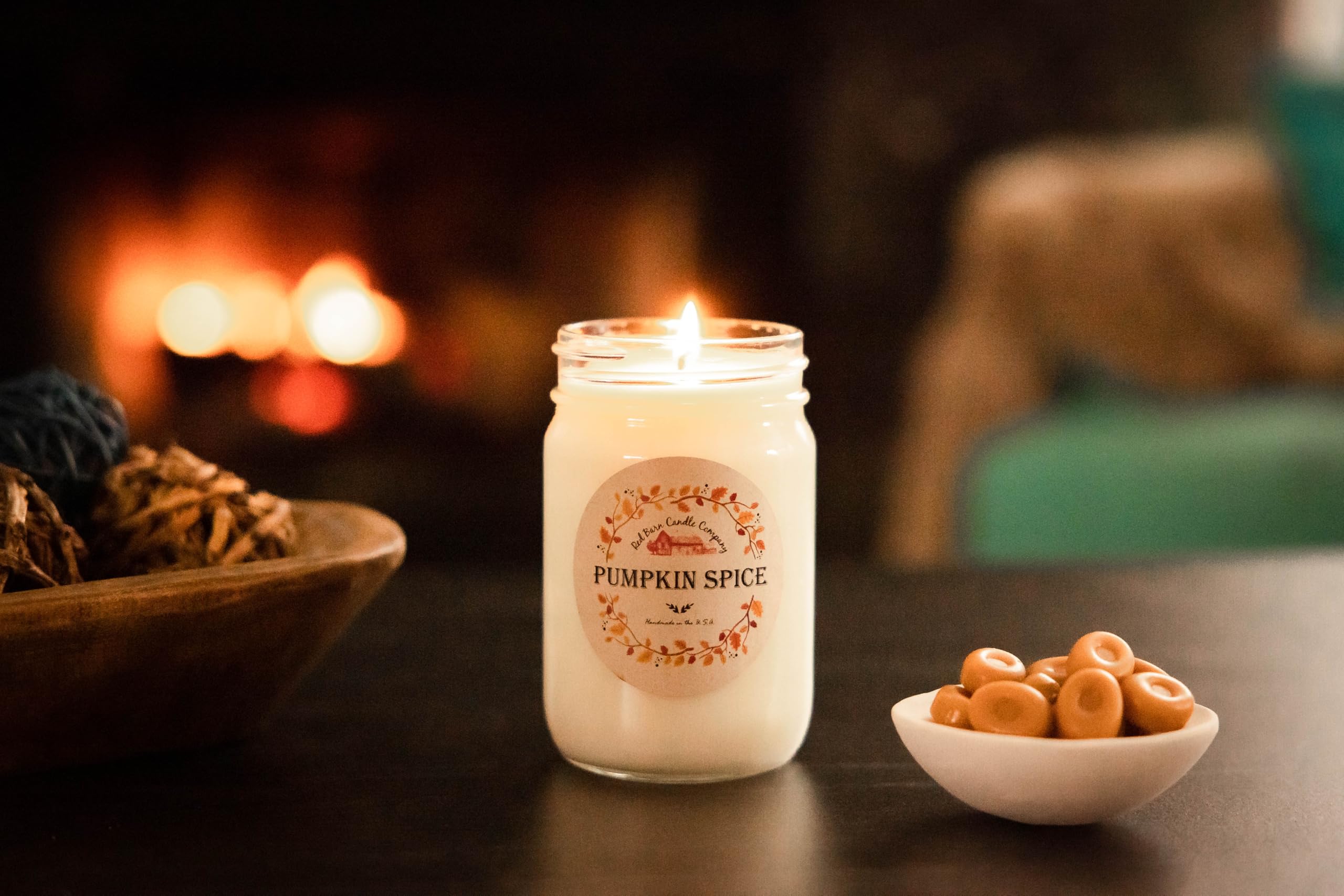 Handmade label on Red Barn pumpkin spice candle highlights quality craftsmanship.