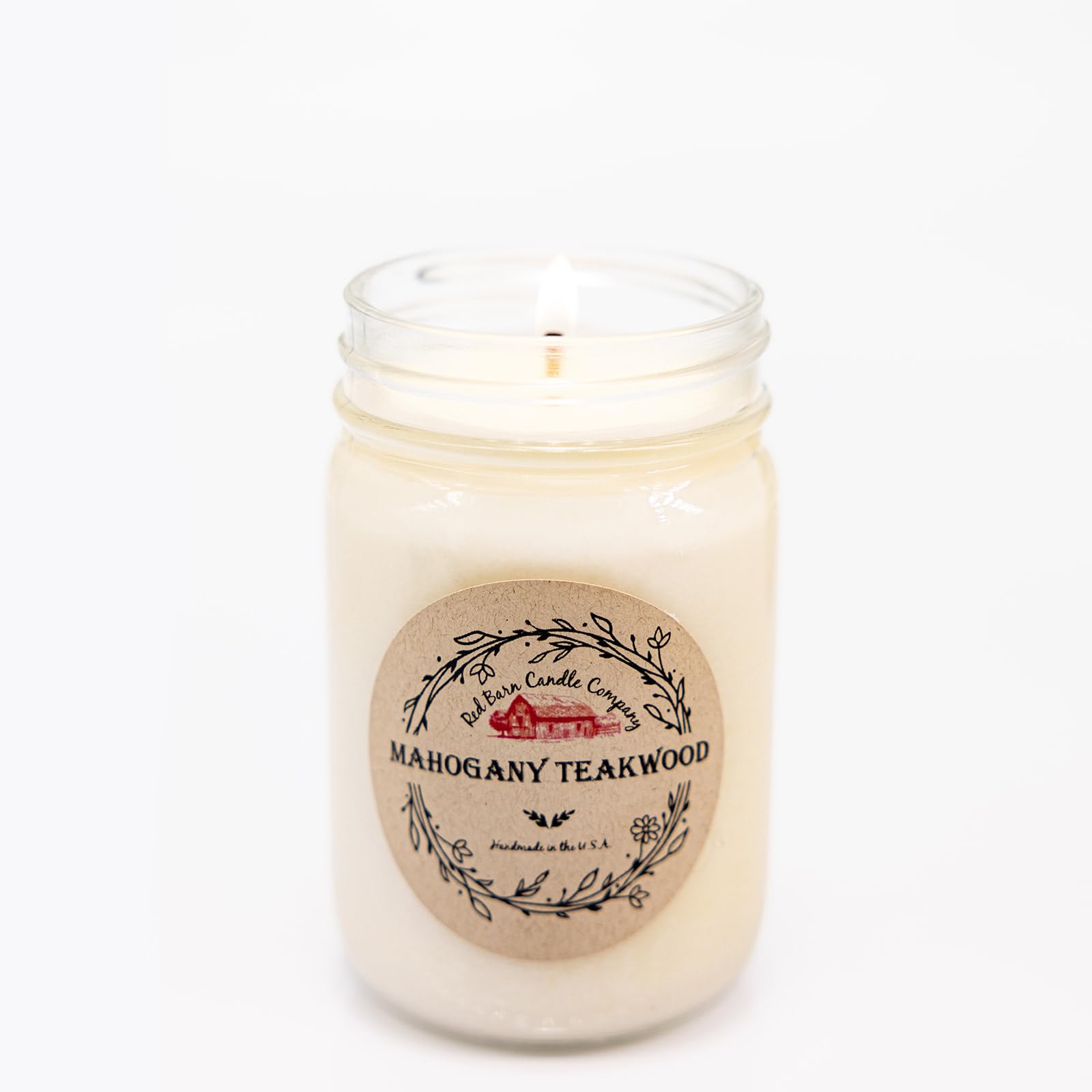Red Barn Teakwood Aromatherapy Candle packaging presents a thoughtful gift option.
