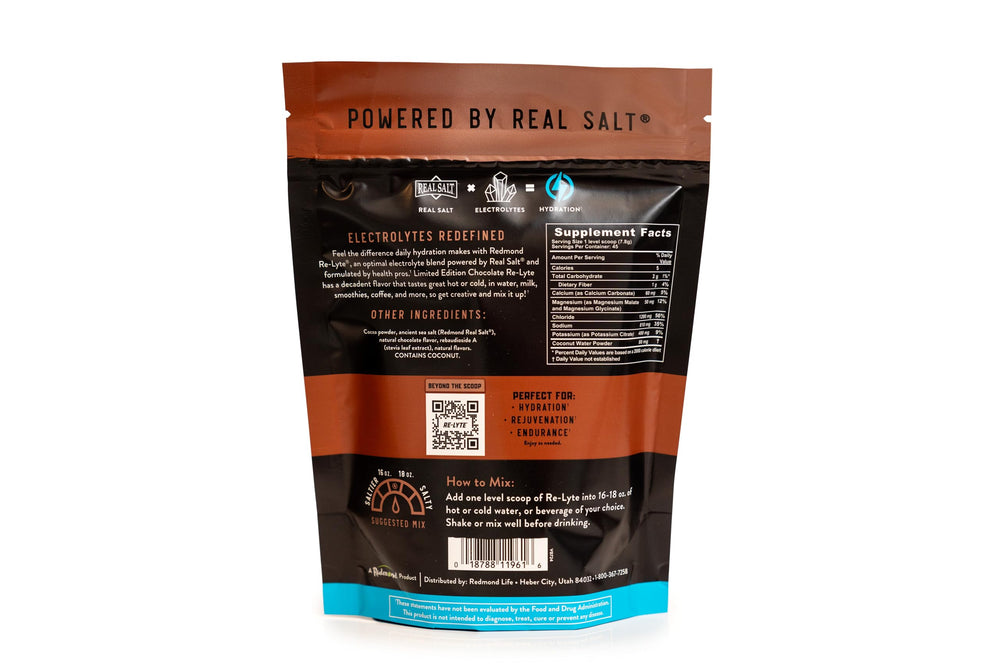 REDMOND Re-Lyte Chocolate powder dissolving in water for refreshing hydration.