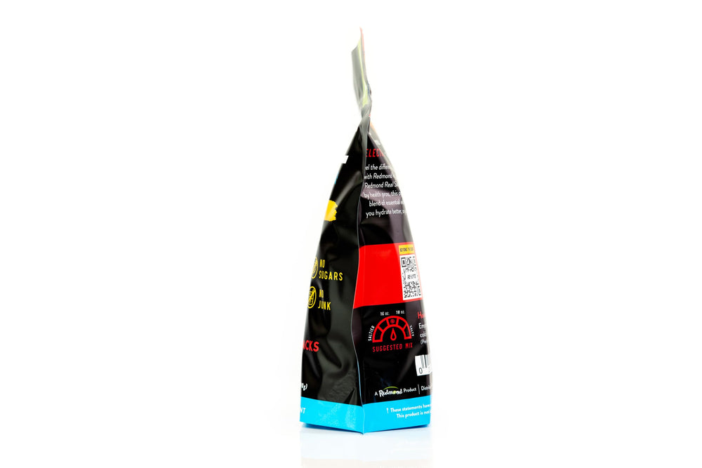 REDMOND Re-Lyte powder dissolving in water for quick, clean hydration.