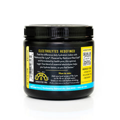 Redmond Re-Lyte Piña Colada scoop dispensing electrolyte mix easily.