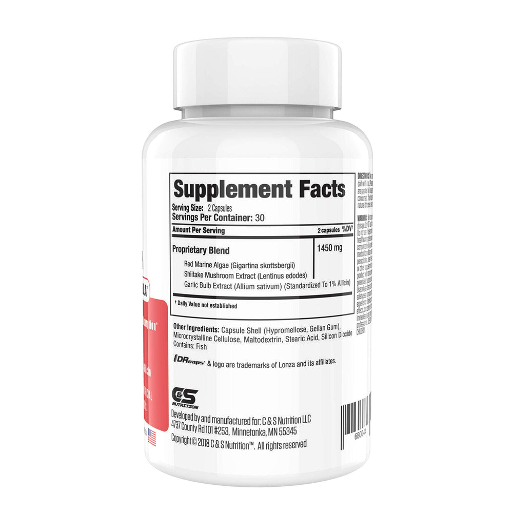 Busy woman taking capsules during morning routine