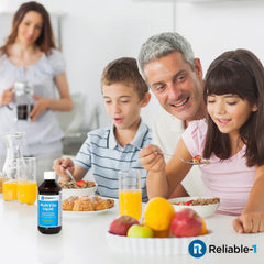 Reliable-1 Multi-Vite dosing spoon beside bottle for easy daily use