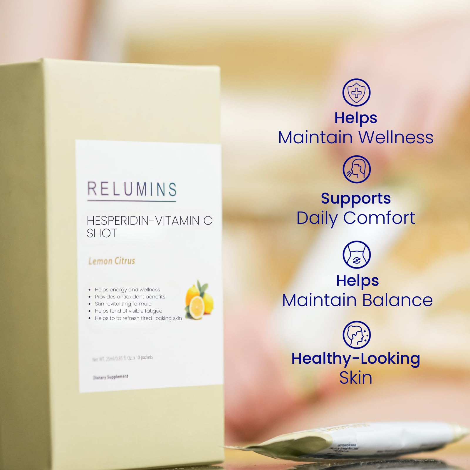 Relumins Vitamin C Shots packaging shown beside fresh lemons to convey flavor and freshness.