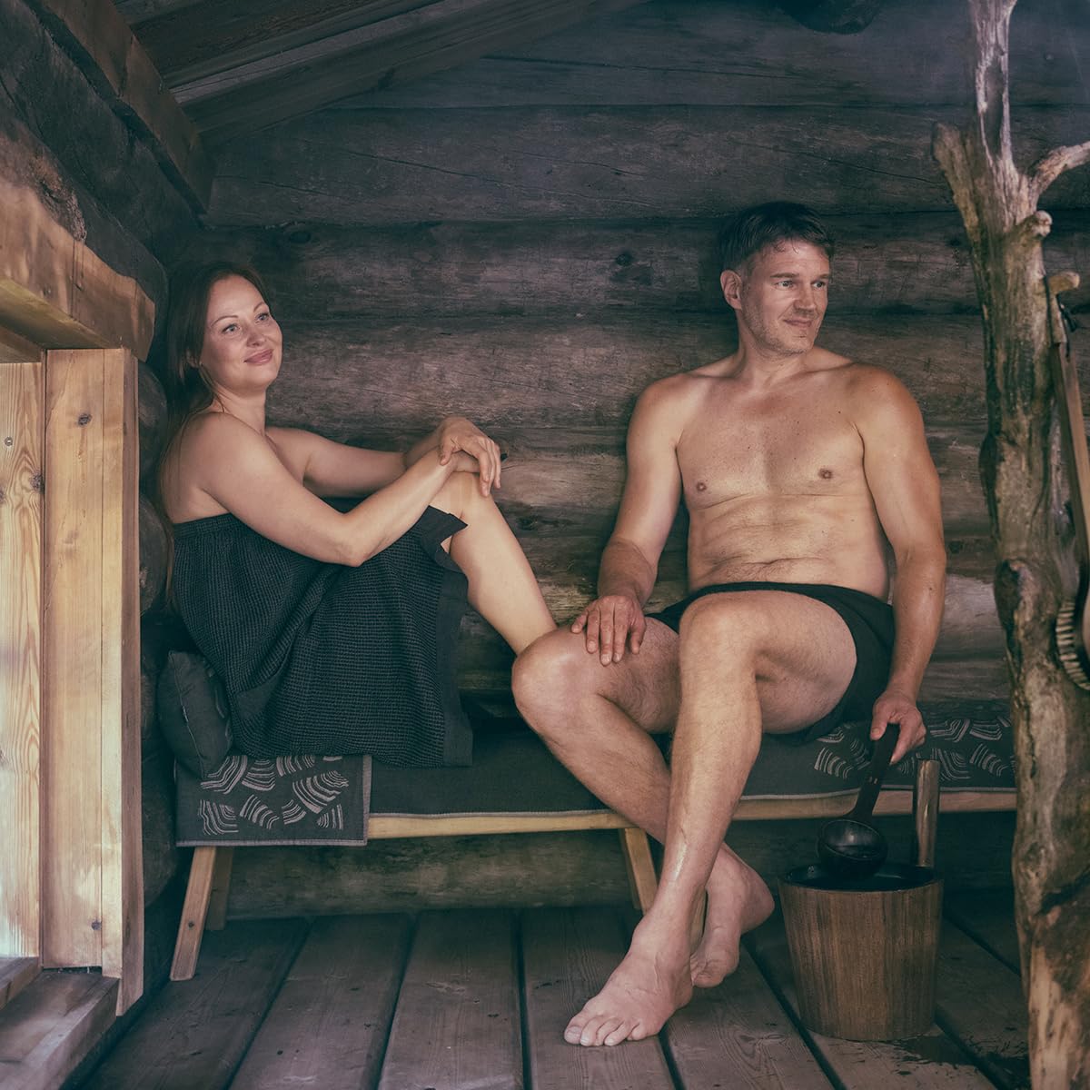 Rento Birch Sauna Scented Oil used near water releases a forest aroma.
