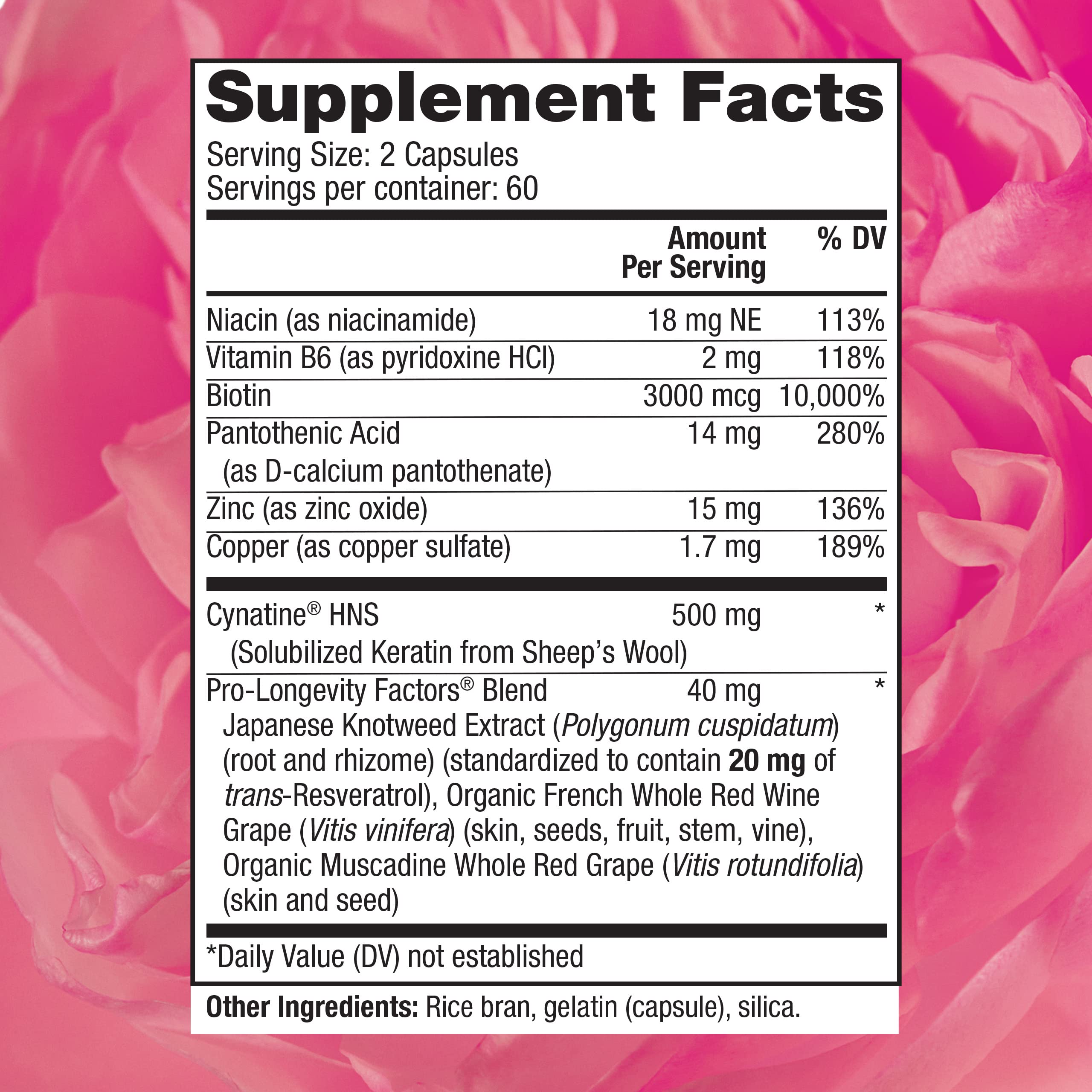 Close-up of capsules highlighting convenient daily dosage for hair and nails.