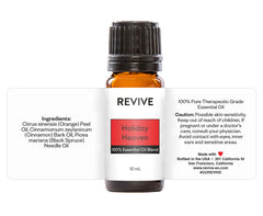 REVIVEEO Holiday Heaven diffuser releasing festive fragrance in a room