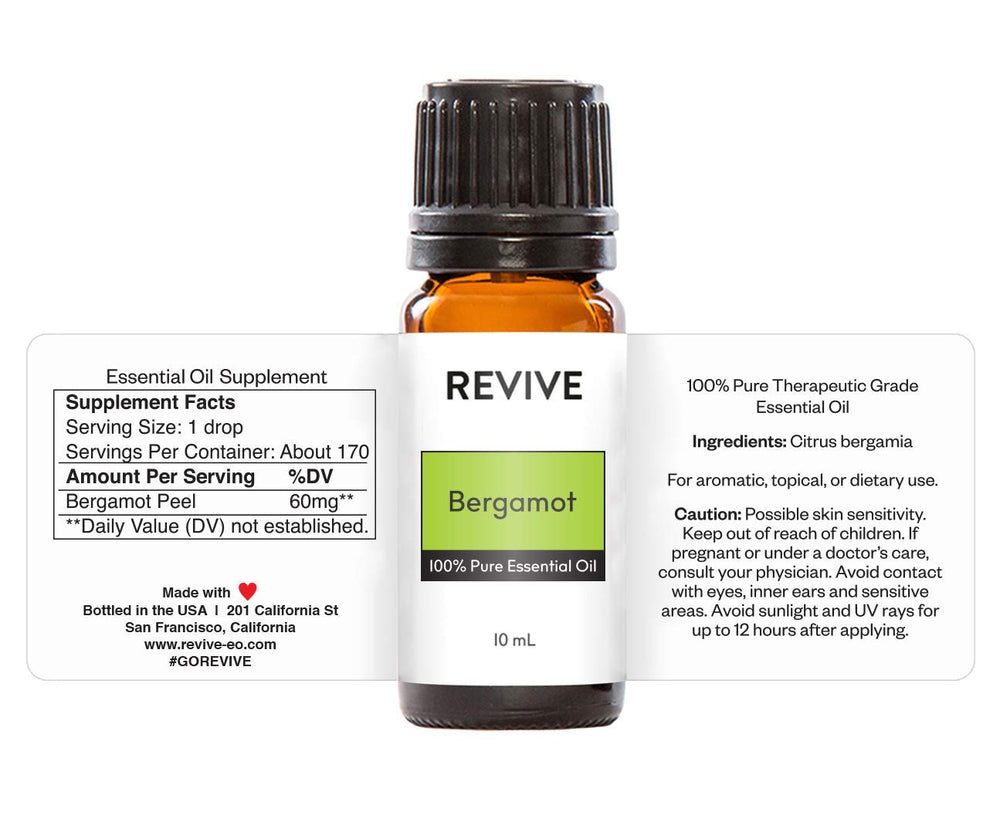 REVIVEEO Bergamot oil in a diffuser setup with uplifting citrus aroma.