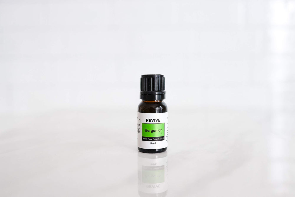 REVIVEEO Bergamot oil used in hair care for shine and freshness.