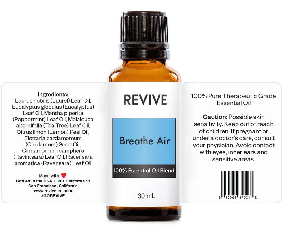 REVIVEEO Breathe Air diffuser mist releasing aroma for a calming room.