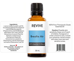 REVIVEEO Breathe Air diffuser mist releasing aroma for a calming room.
