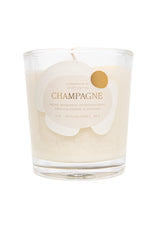 Rewined Champagne scented candle, 10oz bottle, creates elegant ambiance for gatherings.