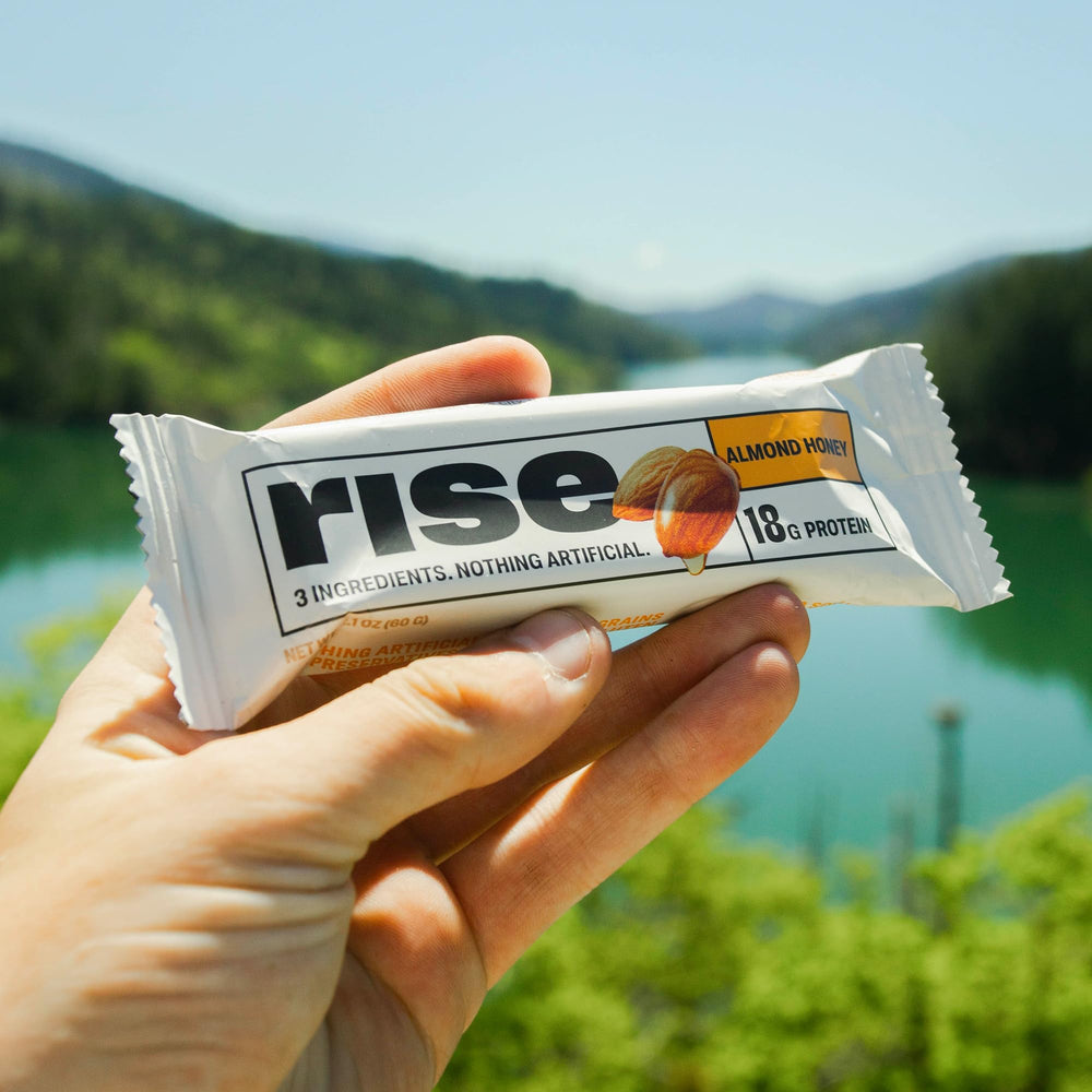Rise Almond Honey breakfast bar with coffee, versatile pairing for morning rituals.