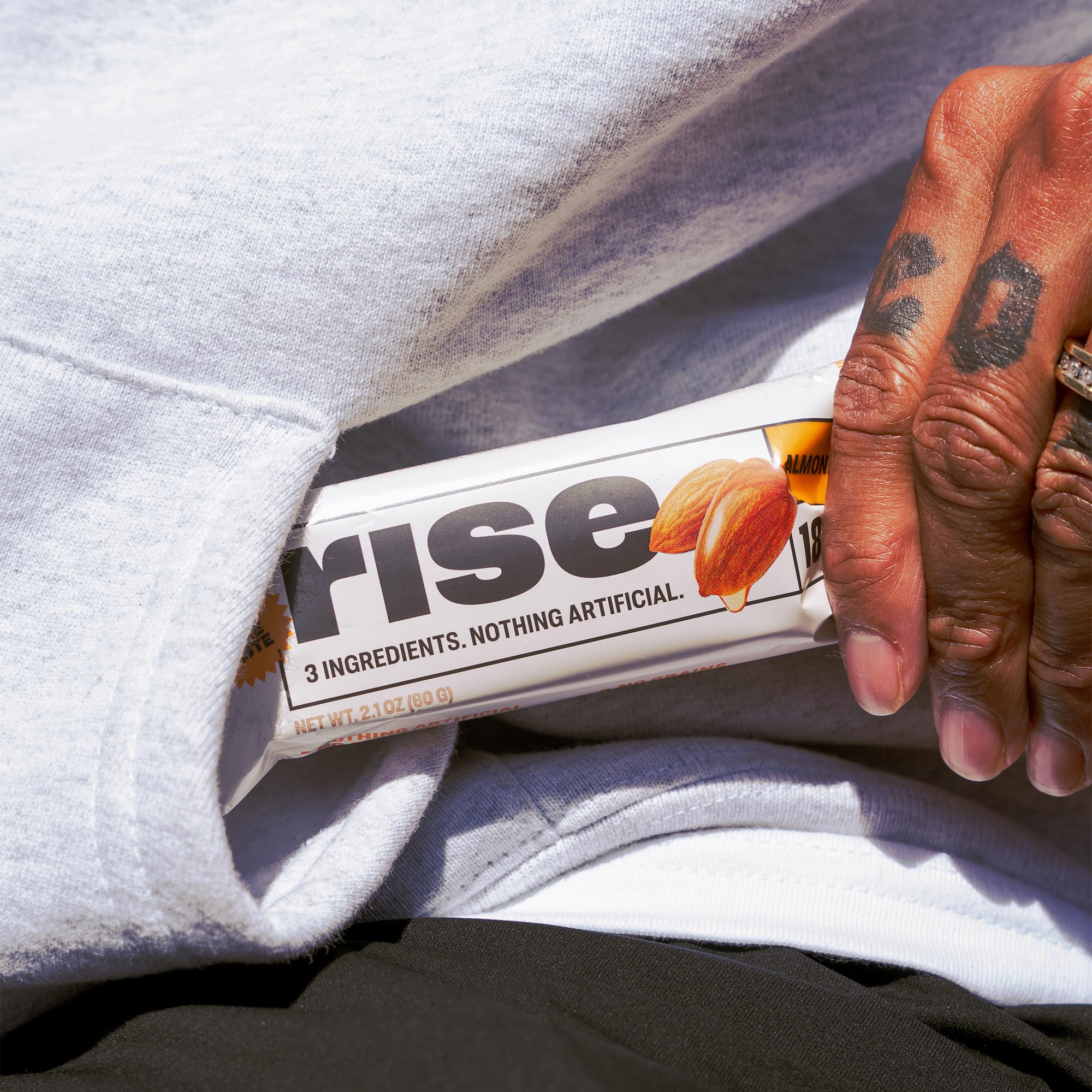 Rise Almond Honey breakfast bar outdoors, fueling active days with real ingredients.