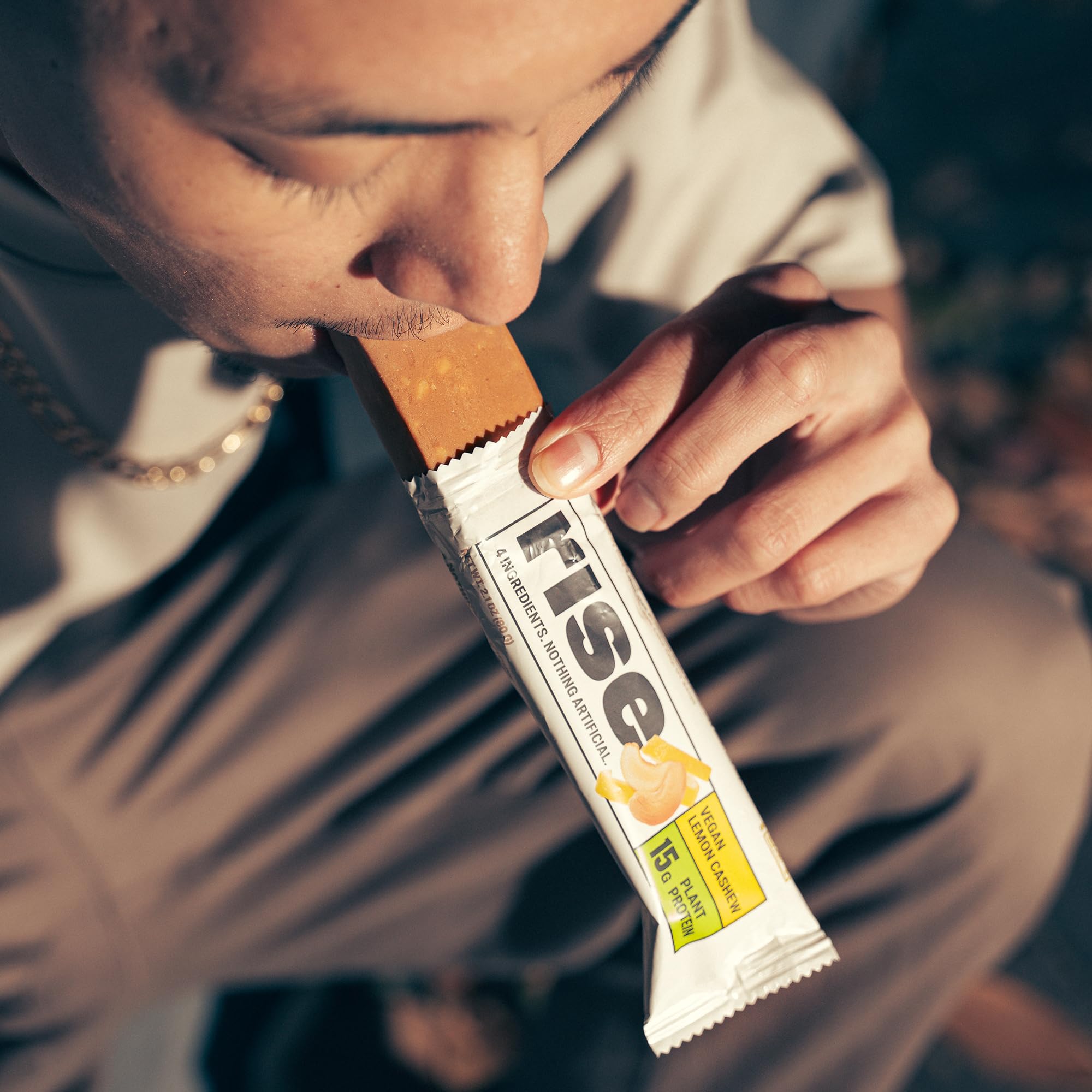 Rise Pea Protein Bar lemon cashew snack showcases versatile use with coffee, shakes, or smoothies.