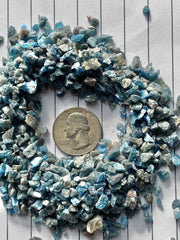 Rise Perspective blue apatite chips on display inspire calm focus during creative sessions.