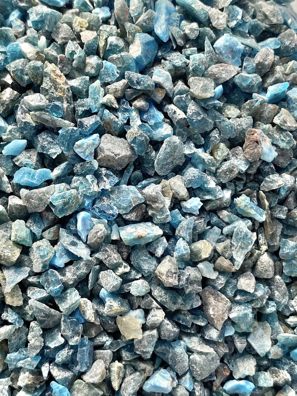 Rise Perspective blue apatite chips close-up for art and jewelry projects.