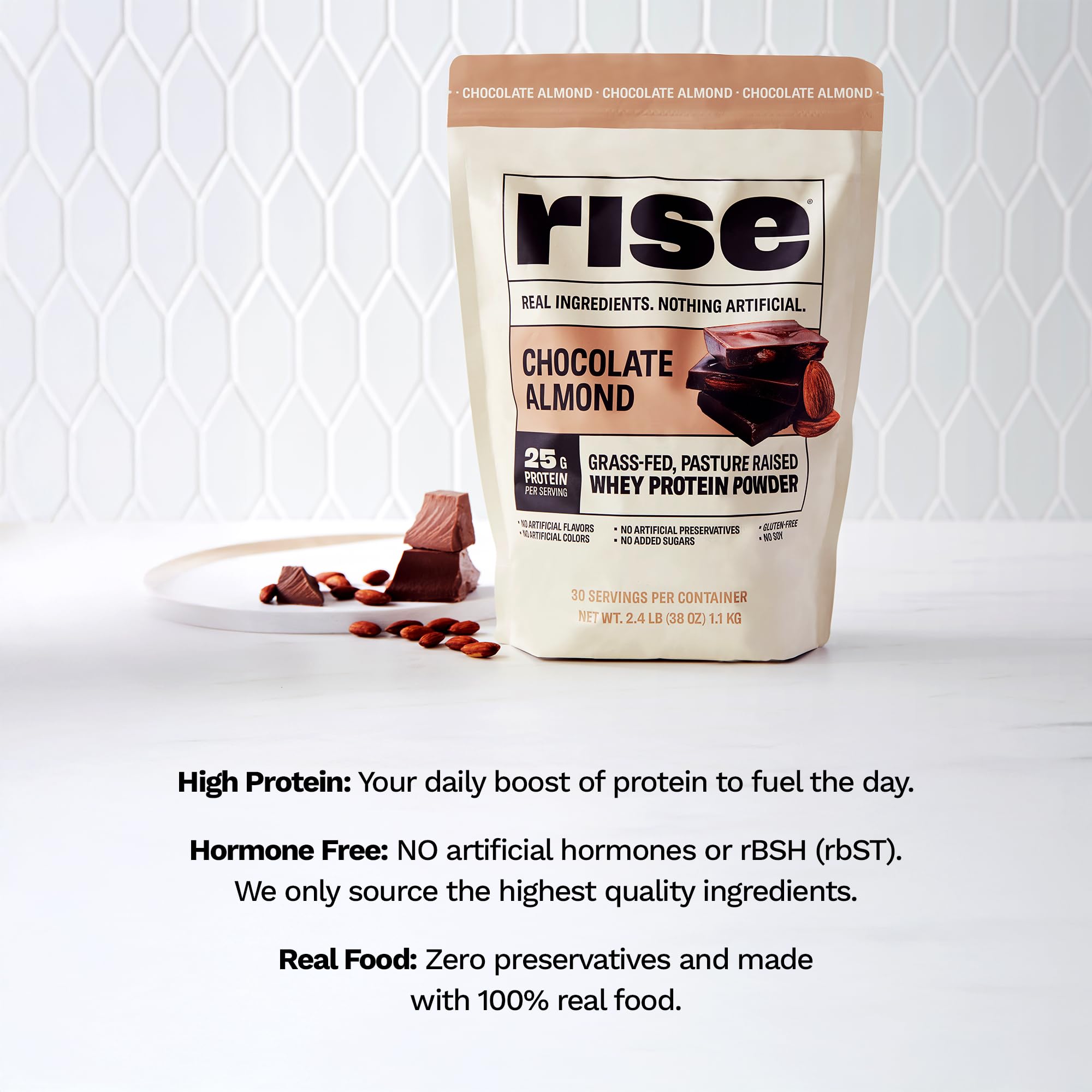 Rise Whey powder poured into a shaker for a quick shake