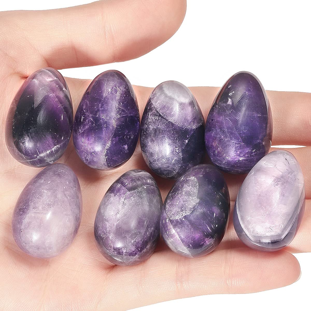 Rockcloud amethyst pocket stone in hand offers a smooth, soothing feel.