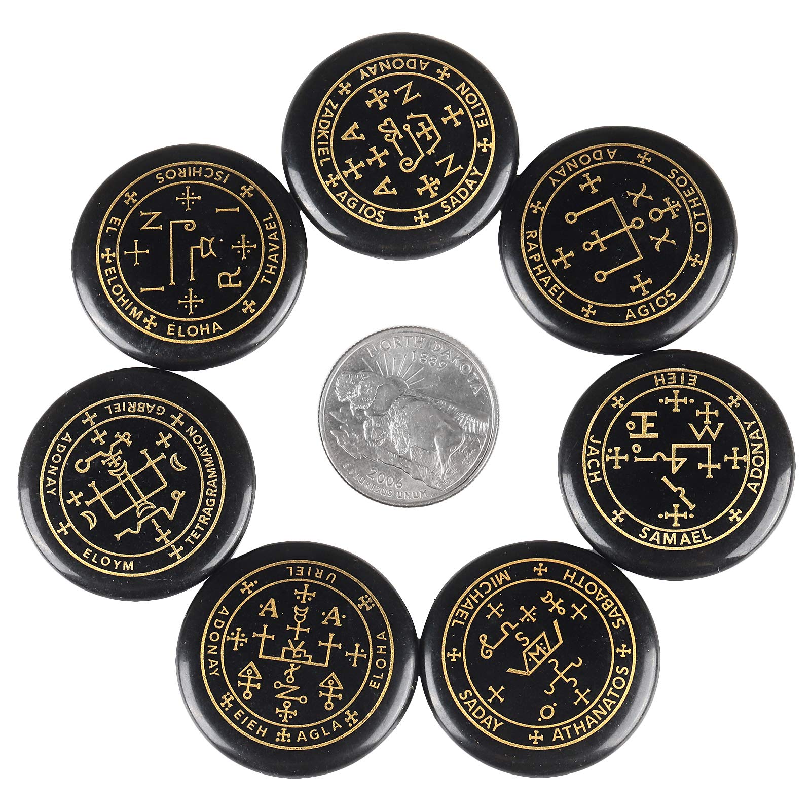 Rockcloud black agate palm stones with etched symbols for meditation.