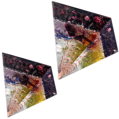 Rockcloud garnet crystal pyramid closeup, showing vibrant color and energy ambiance for meditation.