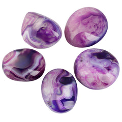 Rockcloud oval worry stone in purple agate for mindfulness practice.
