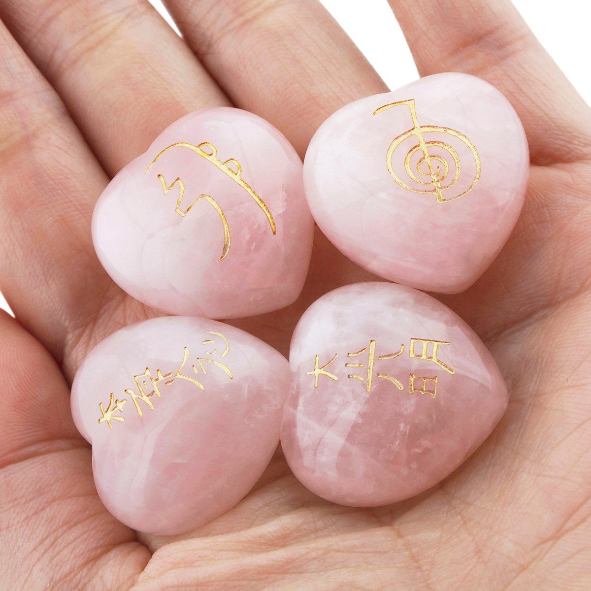 Rockcloud rose quartz heart with Reiki etchings for focus during meditation