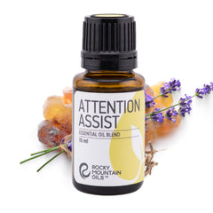 Rocky Mountain Oils Attention Assist bottle pour for quick focus.