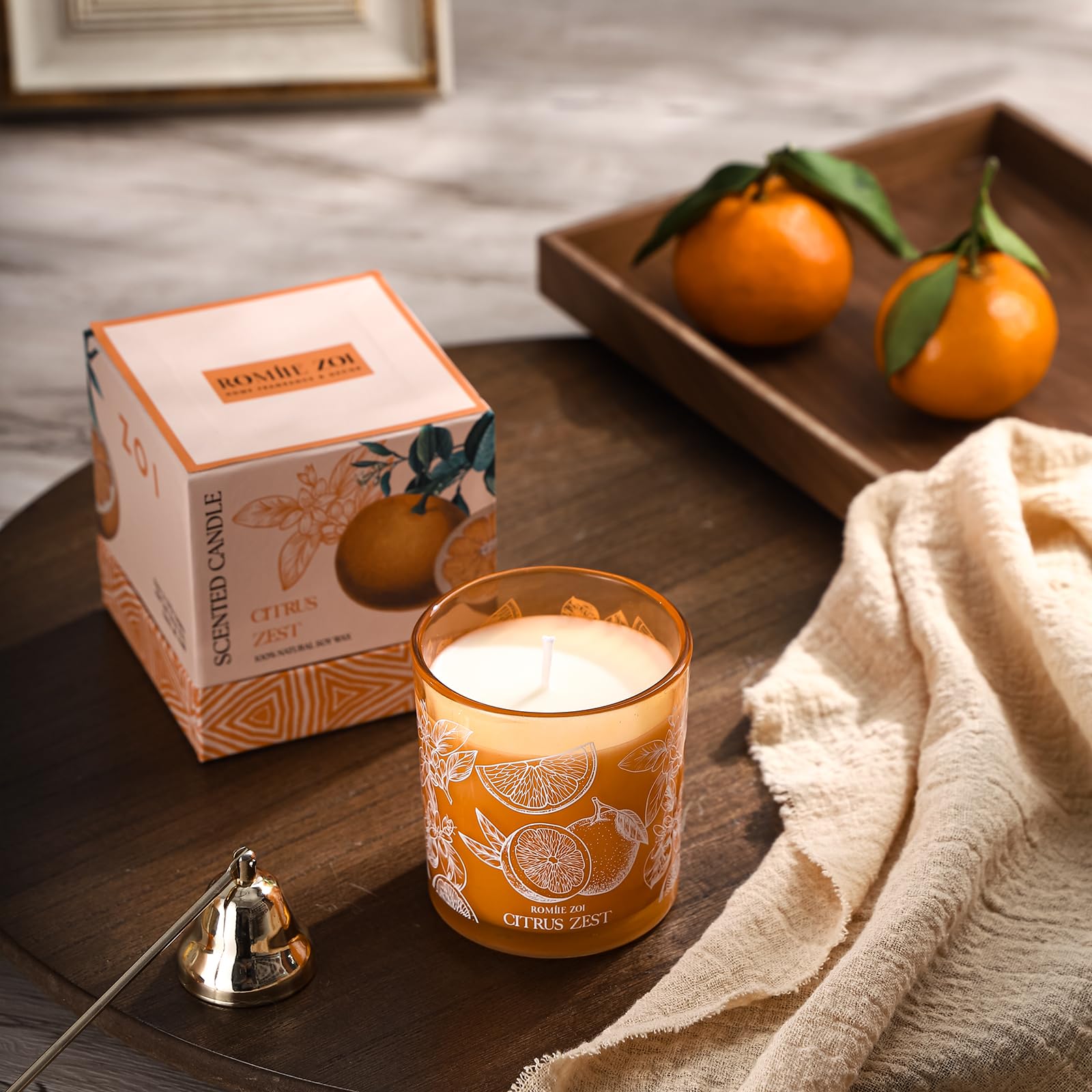 ROMIIE ZOI candle in living room creates calm ambiance.