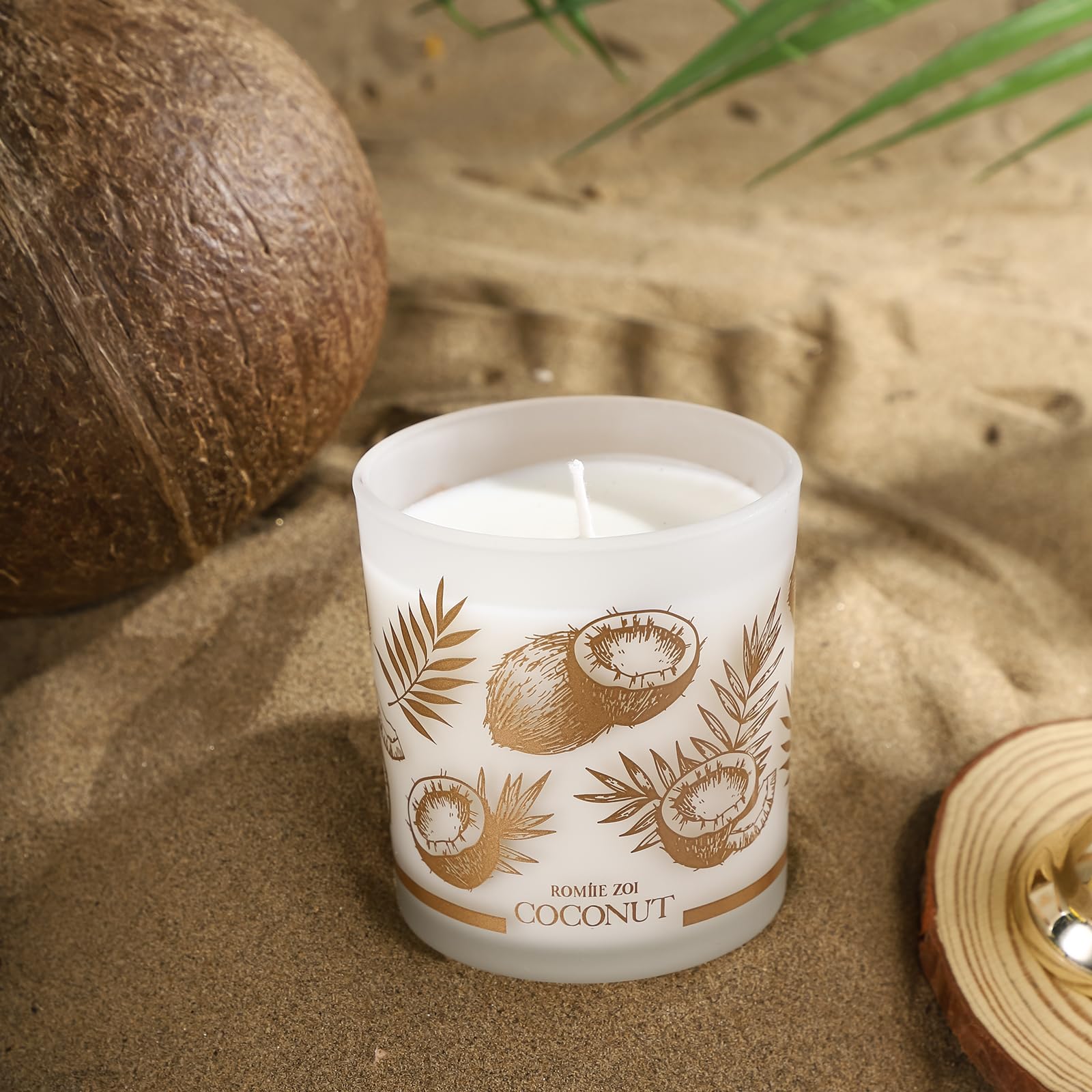 ROMIIE ZOI candle lit on a cozy table to create calm spaces.