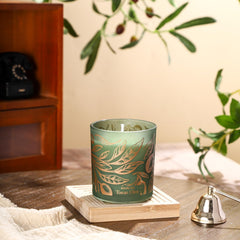 ROMIIE ZOI candle wick foreground demonstrates steady burn for hours of enjoyment.