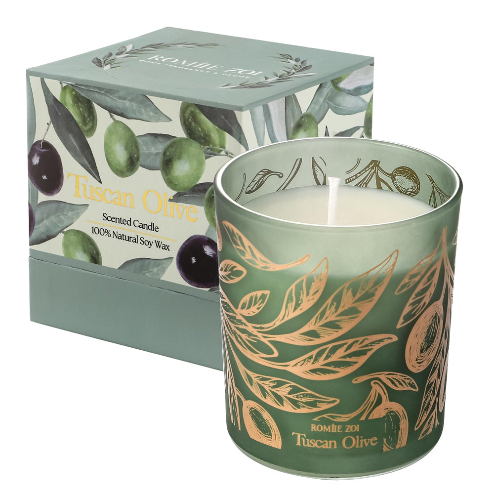 ROMIIE ZOI Tuscan Olive candle jar glows softly in the living room for calm ambiance.