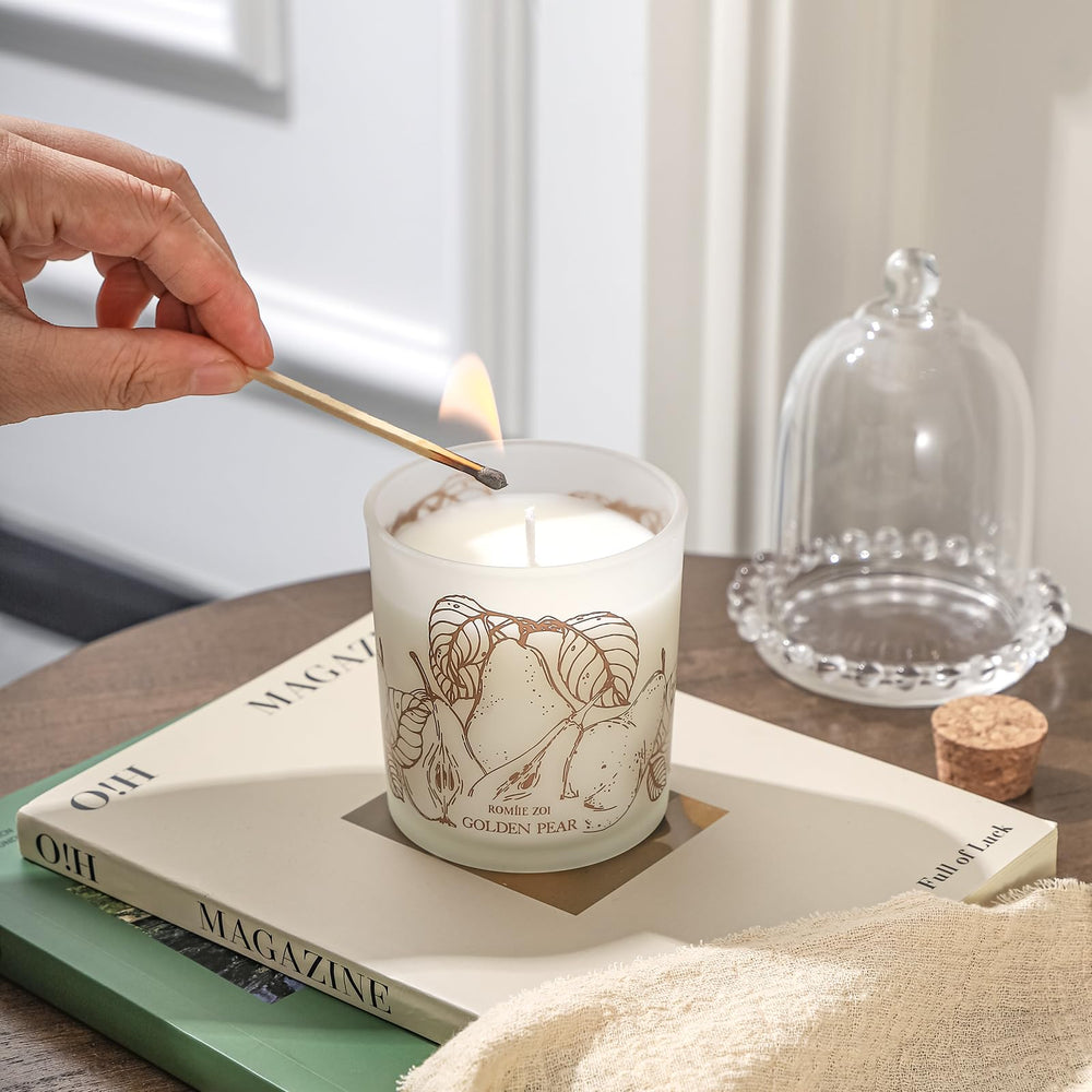 ROMIIE ZOI Golden Pear gift candle in keepsake box for celebrations.