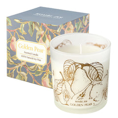 ROMIIE ZOI Golden Pear candle close-up reveals a rich, fruity fragrance for cozy spaces.