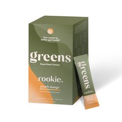 Rookie Wellness greens powder jar showing the whole-food blend for daily gut support.