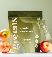 Rookie Wellness Greens powder scoop beside the tub for easy daily intake