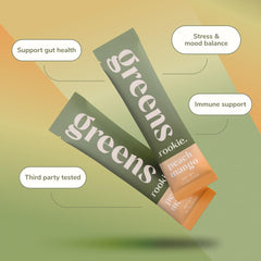 A glass of Rookie Wellness Greens shake featuring peach mango for a refreshing daily greens drink.