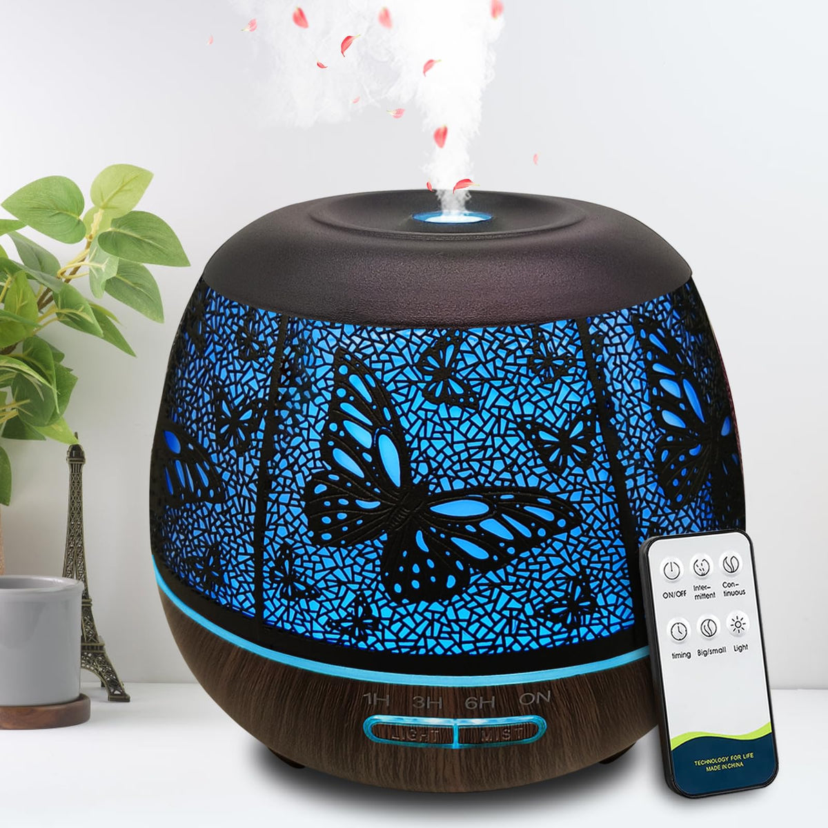 Roonbo Butterfly Diffuser 400ml tank glows softly in a calm bedroom ambiance