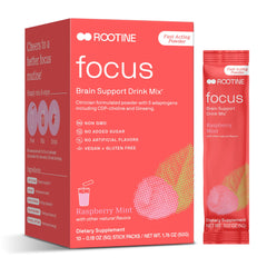 Rootine Focus bottle being poured into a glass for a quick energy moment
