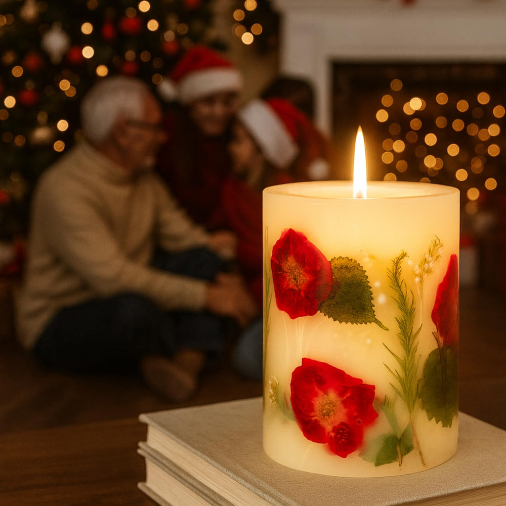 Rosy Rings Essence of Christmas candle highlights rosemary botanicals for subtle holiday scent.