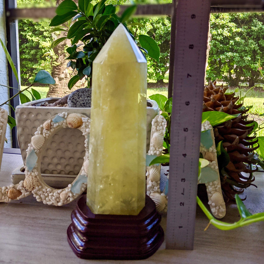 Roxxy Crystals large citrine point tower detail on display.