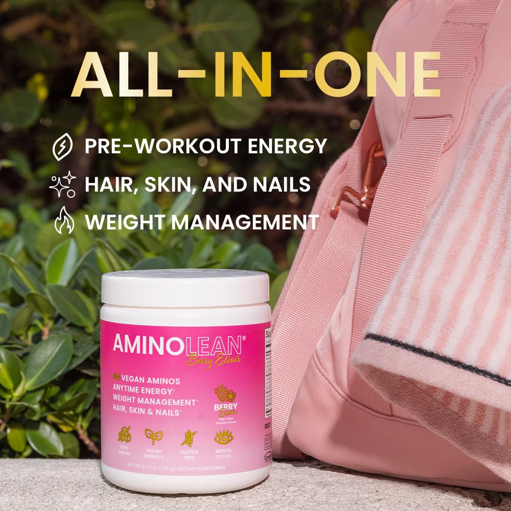 AminoLean Berry Elixir scoop beside the bottle for easy mixing.