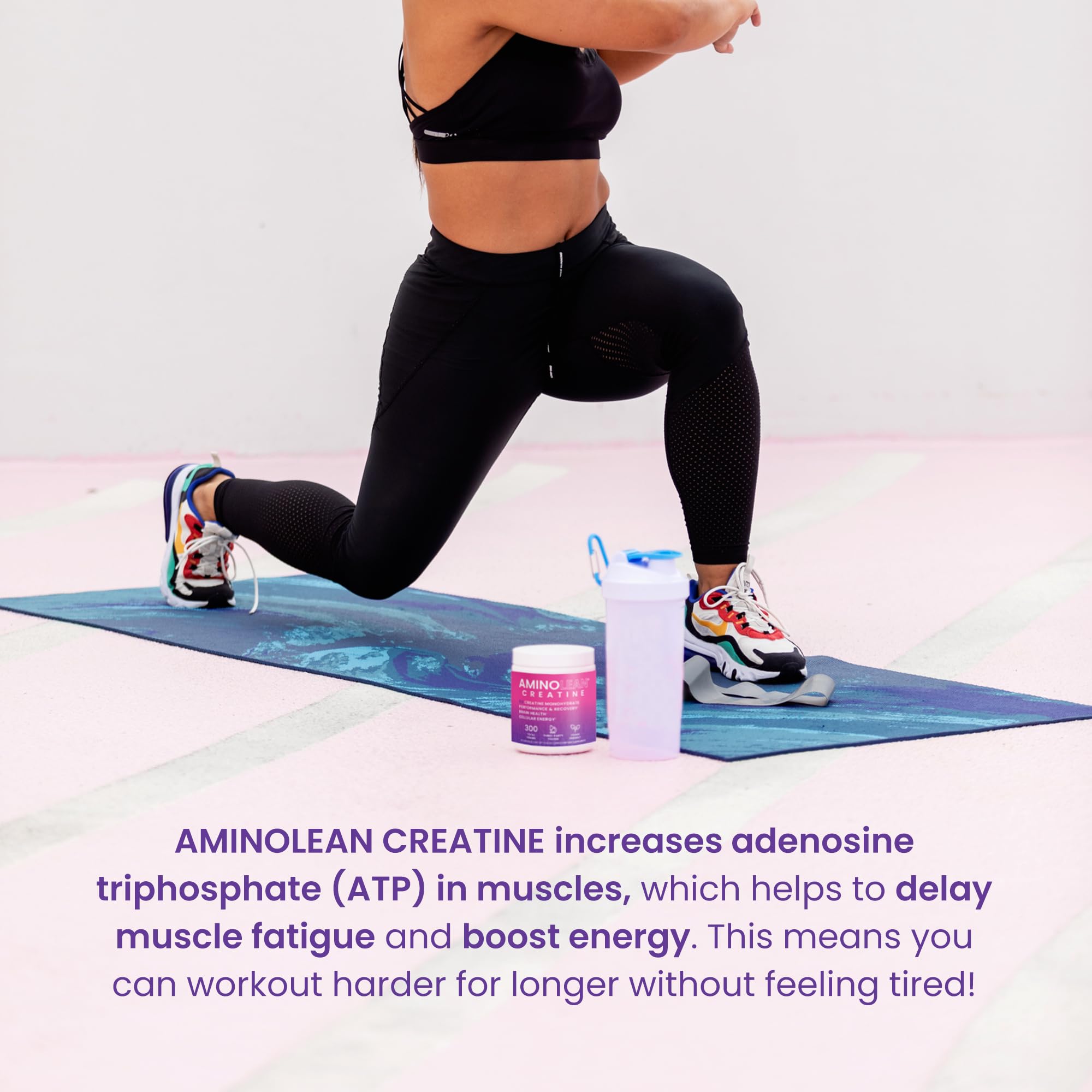 Women lifting weights showcases AminoLean Creatine supporting lean tone during workouts.