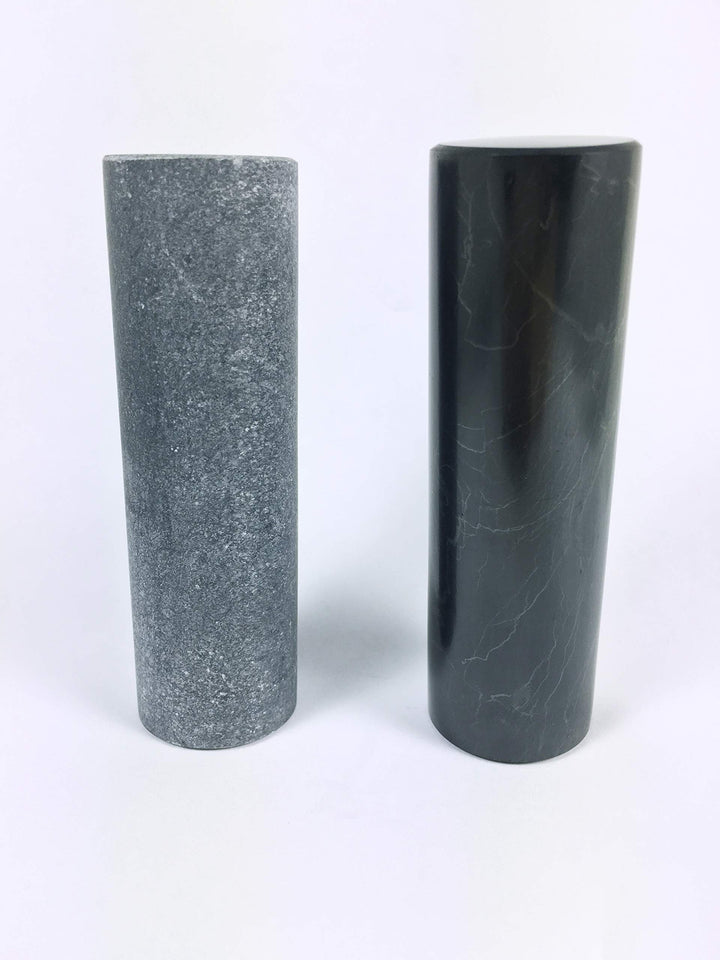 RTI Trade shungite closeup showing smooth finish and ergonomic grip.