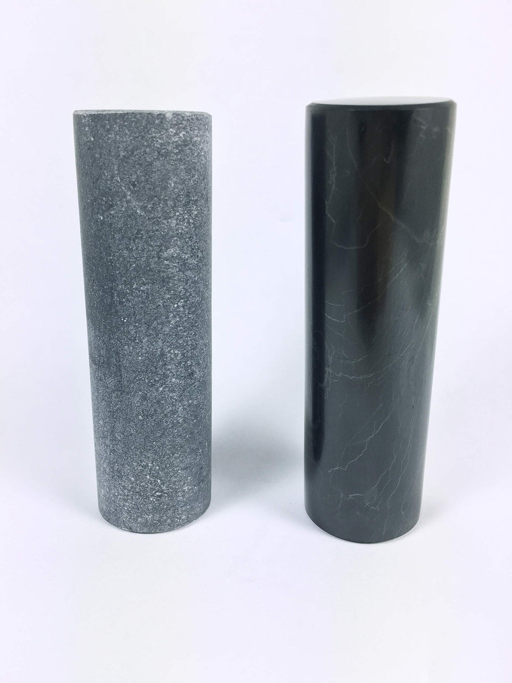 RTI Trade shungite closeup showing smooth finish and ergonomic grip.