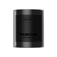 Ruechi Beauty luxury soy candle close-up with lily and jasmine for serene ambiance