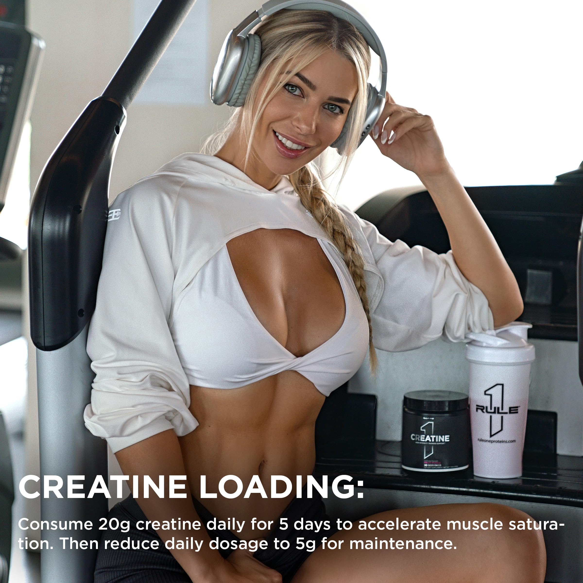 Rule 1 Creatine Powder on gym counter ready to support workouts.