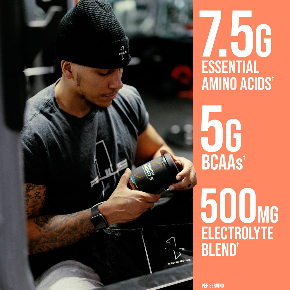 Rule 1 Essential Amino 9 powder pours into a shaker for hydration